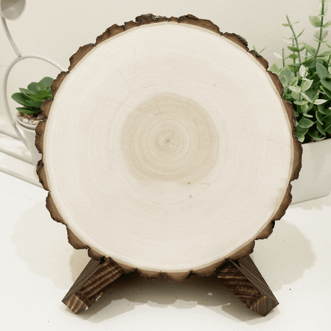 Blank wood slice product on a wooden stand